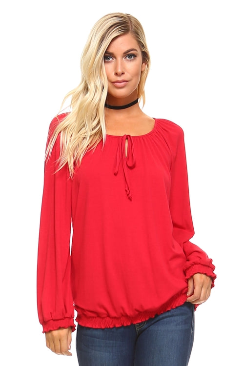 Elegant women's long sleeve solid top in classic style.