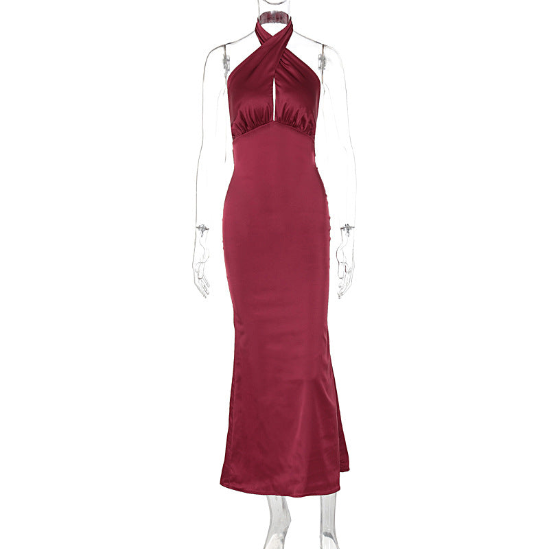 Elegant backless sleeveless dress with chic design.