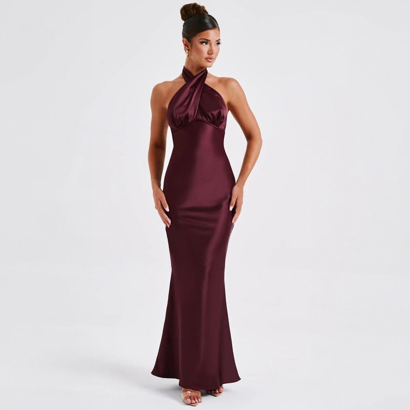 Elegant backless sleeveless dress with chic design.