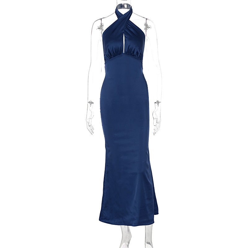 Elegant backless sleeveless dress with chic design.