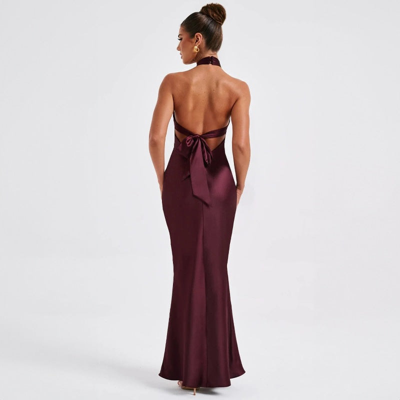 Elegant backless sleeveless dress with chic design.